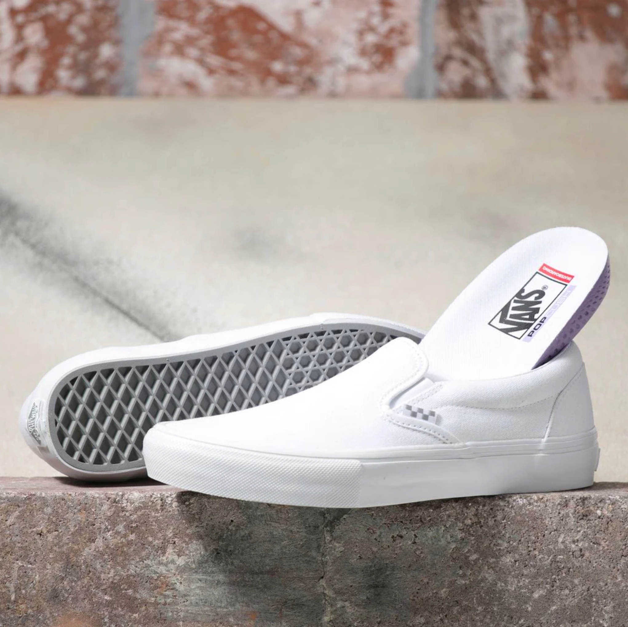 Solid white vans slip ons sales